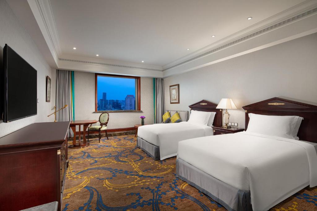 Crowne Plaza Nanjing Road slaapkamer bedden