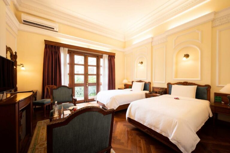 Hotel Majestic Saigon kamer met twee bedden
